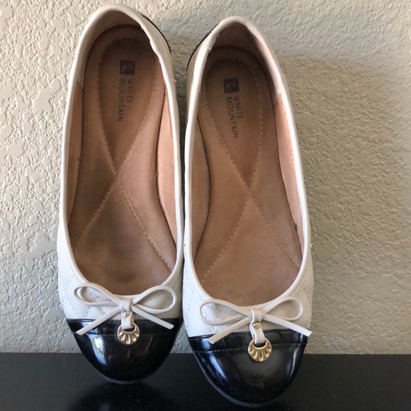 cream and black flats